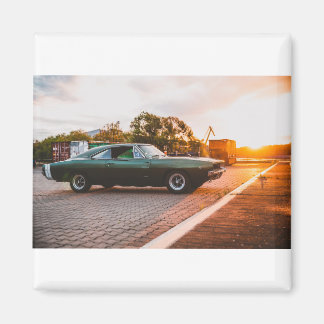 Green muscle car at sunset magnet