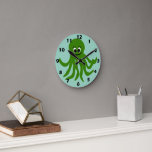 Green Octopus Design Round Clock<br><div class="desc">This octopus design wall clock is a timekeeping device designed to hang on a wall, serving as both a functional tool and a decorative focal point for a room. Made from acrylic and features a pre-installed backside hanging slot for easy hanging and a non-ticking design. You can customise this wall...</div>