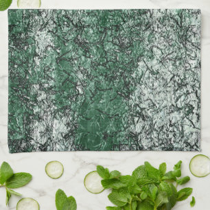 Green oil texture upon sticks and lint tea towel