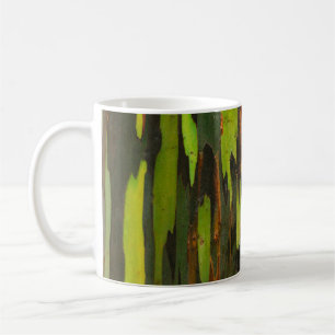 Green, orange, and black abstract painting coffee mug