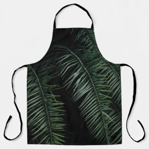GREEN PALM PLANT DURING NIGHT TIME APRON