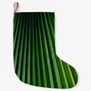 Green palm tree leaves small christmas stocking