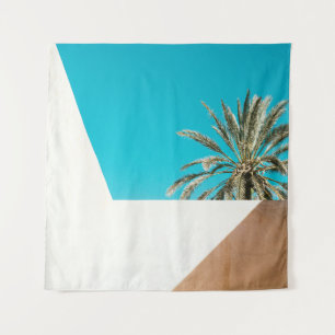 Green palm tree under blue sky in the morning tapestry