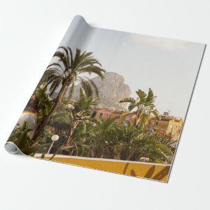 Green palm trees near brown concrete building in t wrapping paper