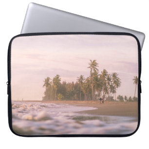 GREEN PALM TREES ON BROWN SAND UNDER WHITE CLOUDS LAPTOP SLEEVE