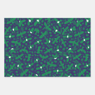 Green pigeons on blue wrapping paper sheet