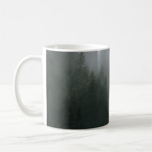 GREEN PINE TREES COVERED WITH FOG COFFEE MUG