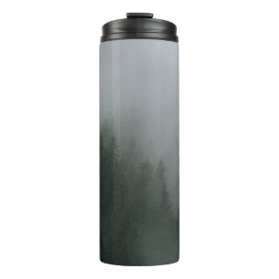 GREEN PINE TREES COVERED WITH FOG THERMAL TUMBLER