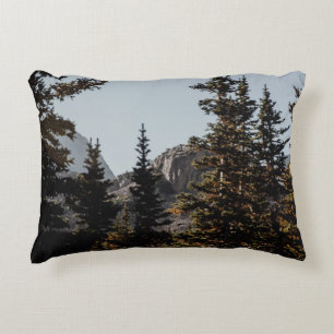 GREEN PINE TREES NEAR MOUNTAIN DURING DAYTIME DECORATIVE CUSHION