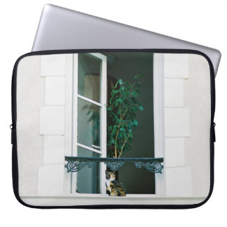 GREEN PLANT ON WHITE WINDOW LAPTOP SLEEVE