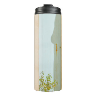 GREEN PLANT WITH CERAMIC VASE BESIDE WHITE WOODEN THERMAL TUMBLER