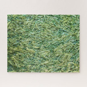 Green plastic or fake grass background jigsaw puzzle