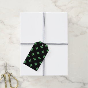 Green polka crosses on black gift tags