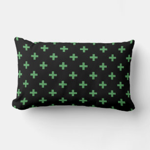 Green polka crosses on black lumbar cushion