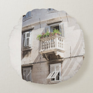 GREEN POTTED PLANT ON BROWN CONCRETE HOUSE BALCONY ROUND CUSHION