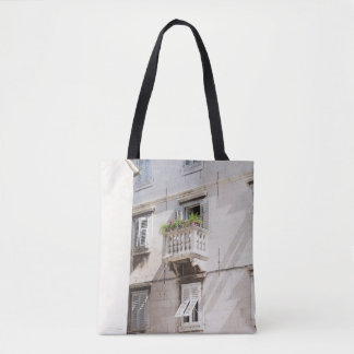 GREEN POTTED PLANT ON BROWN CONCRETE HOUSE BALCONY TOTE BAG