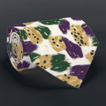 Green Purple Gold Brushstrokes  Pattern  Tie<br><div class="desc">The Green Purple Gold Brushstrokes Pattern Neck Tie is a bold accessory that adds a touch of artistic flair to any outfit. With its vibrant blend of green, purple, and gold brushstroke patterns, this tie brings an element of creativity and sophistication to your wardrobe. The luxurious colours are perfect for...</div>