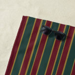 Green Red And Gold Christmas Candy Stripes Beach Towel<br><div class="desc">Beach Towel printed with Gold Green And Red Christmas Candy Stripes artwork design illustration art by TheFabricSeal at Zazzle. http://www.thefabricseal.zazzle.com #Zazzlemade. This elegant vintage holiday gift wrap inspired colours and design is filled with bright and bold striping in both horizontal and vertical linear pattern with influence of modern yet classic...</div>