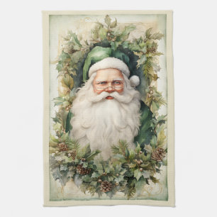 Green Santa Claus Framed in Christmas Foliage Tea Towel