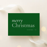 Green Simple Serif Merry Christmas Holiday Card<br><div class="desc">Modern simplicity makes this understated,  text-based holiday card shine in classic Christmas colours of green and white. The custom backer features two of your best photos from the year and easy to personalise message text.</div>
