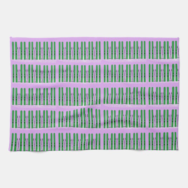 Green skis on purple kitchen towel (Horizontal)
