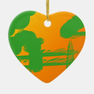 green smudges in orange ceramic tree decoration