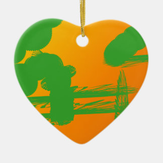 green smudges in orange ceramic tree decoration