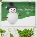 Green Snowman Winter Scene Christmas Kitchen Towel<br><div class="desc">Add a holiday touch to your kitchen with this whimsical Green Snowman Winter Scenery Christmas Kitchen Towel. Towel design features a happy snowman in a snowy wintry scene against a green background adorned with matching colour snowflakes. Additional gift and holiday items available with this design as well.</div>