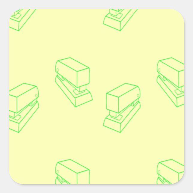 Green stapler on yellow square sticker (Front)