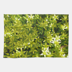 green star like flowers herbal plant tea towel