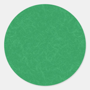 Green textured surface with swirling pattern classic round sticker