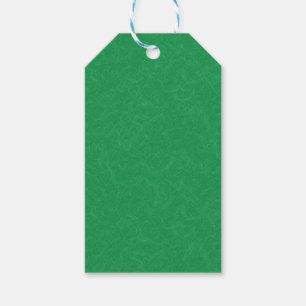 Green textured surface with swirling pattern gift tags