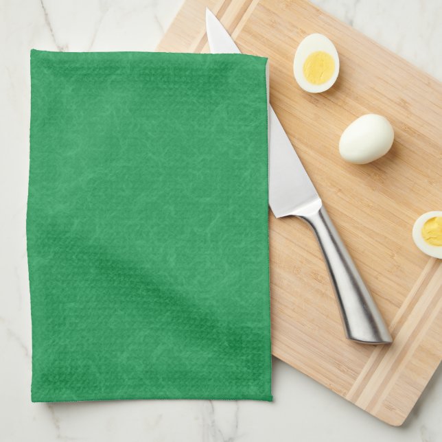 Green textured surface with  swirling pattern tea towel (Quarter Fold)