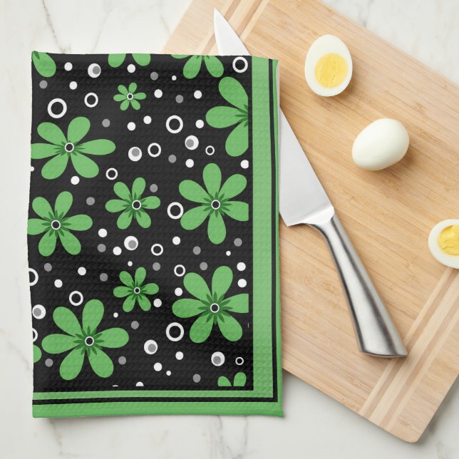 Green towel with flower border (Quarter Fold)
