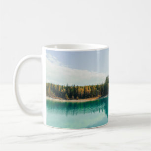 GREEN TREES BESIDE BODY OF WATER DURING DAYTIME COFFEE MUG