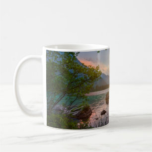 GREEN TREES NEAR BODY OF WATER DURING DAYTIME COFFEE MUG