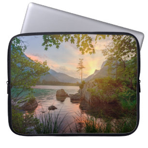 GREEN TREES NEAR BODY OF WATER DURING DAYTIME LAPTOP SLEEVE
