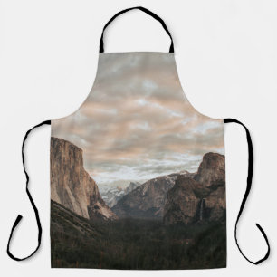 GREEN TREES NEAR BROWN MOUNTAIN UNDER CLOUDY SKY D APRON