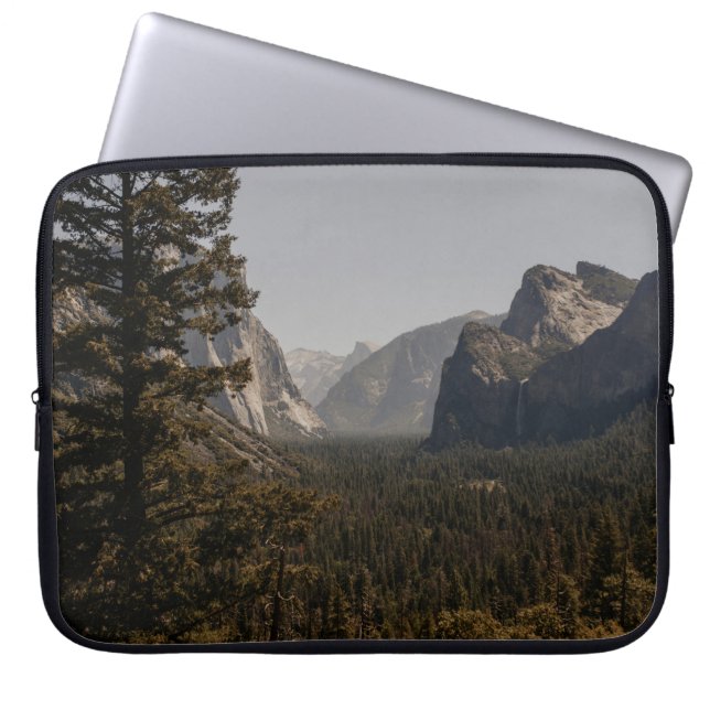 GREEN TREES NEAR MOUNTAIN DURING DAYTIME LAPTOP SLEEVE (Front)