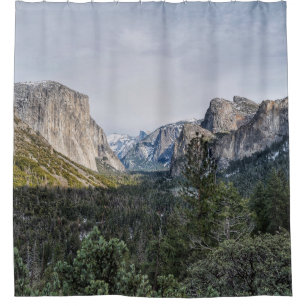 GREEN TREES NEAR MOUNTAIN UNDER CLOUDY SKY DURING SHOWER CURTAIN