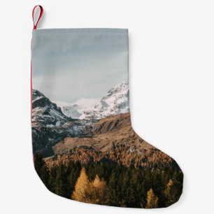 GREEN TREES NEAR SNOW COVERED MOUNTAIN DURING DAYT SMALL CHRISTMAS STOCKING