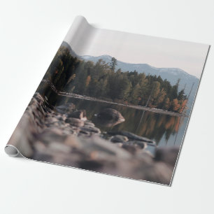 GREEN TREES REFLECTION ON BODY OF WATER DURING DAY WRAPPING PAPER