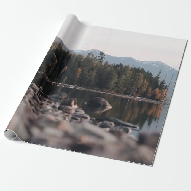 GREEN TREES REFLECTION ON BODY OF WATER DURING DAY WRAPPING PAPER (Unrolled)