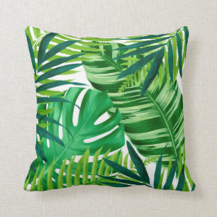 Green tropical leaves cushion