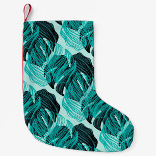 Green tropical palm leaves design. small christmas stocking