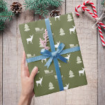 Green white deer pinetree sled pattern Christmas Wrapping Paper<br><div class="desc">Olive green background,  and a Christmas pattern with deer,  pinetree and sled.</div>