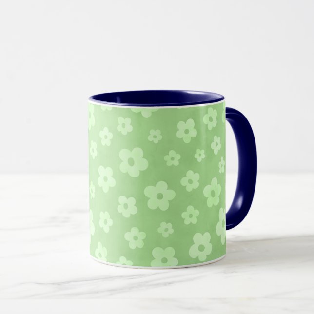 Green & white flowers tea cup with blue handle (Front Right)