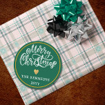 Green  White Gold Merry Christmas Classic Round Sticker<br><div class="desc">Make this holiday season extra special with our Green White Gold Merry Christmas stickers. Whether you're embellishing your homemade gifts or sprucing up your holiday cards, these stickers are the perfect finishing touch. The sophisticated colour palette of black, white, and gold adds a touch of luxury to your Christmas festivities....</div>