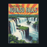 Greetings from Iguazu Falls Postcard<br><div class="desc">Iguazu National Park, a UNESCO World Heritage Site located on the border between Argentina and Brazil, is a breathtaking natural wonder renowned for its cascading waterfalls, lush rainforests, and diverse wildlife. The park's centerpiece is the Iguazu Falls, a series of interconnected waterfalls that stretch for nearly three kilometres along the...</div>