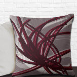 Grey and Burgundy Artistic Abstract Ribbons Cushion<br><div class="desc">Grey and burgundy throw pillow features an artistic abstract ribbon composition with shades of burgundy and grey with white accents on a grey background. This abstract composition is built on combinations of repeated ribbons, which are overlapped and interlaced to form an intricate and complex abstract pattern. The grey, burgundy, white...</div>